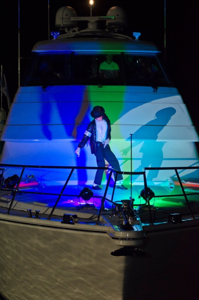 Michael Jackson impersonator performs on the bow of the 70 at the VIP launch party © Stephen Milne